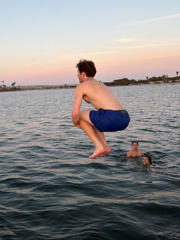Cannonball jump during a Mission Bay hot tub cruise