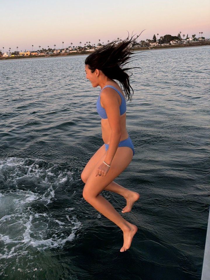 Yu jumping into Mission Bay during the cruise